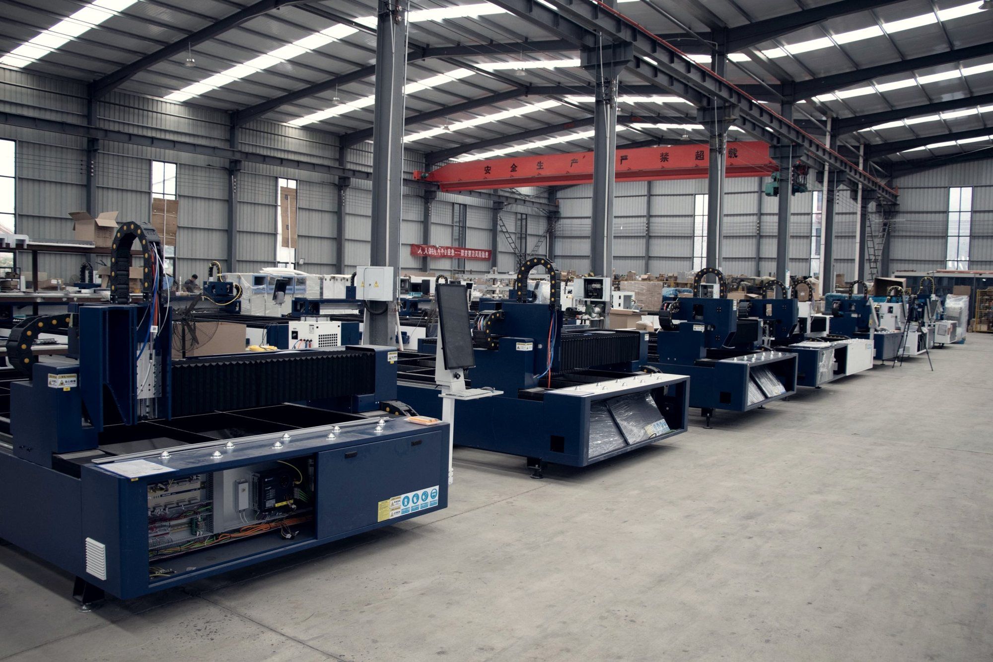 Factory floor with rows of machine tools